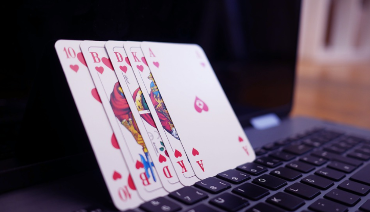 poker cards and laptop